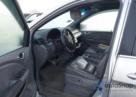 2009 Honda Odyssey Ex-L z USA, uszkodzony, nr VIN 5FNRL386X9B050041